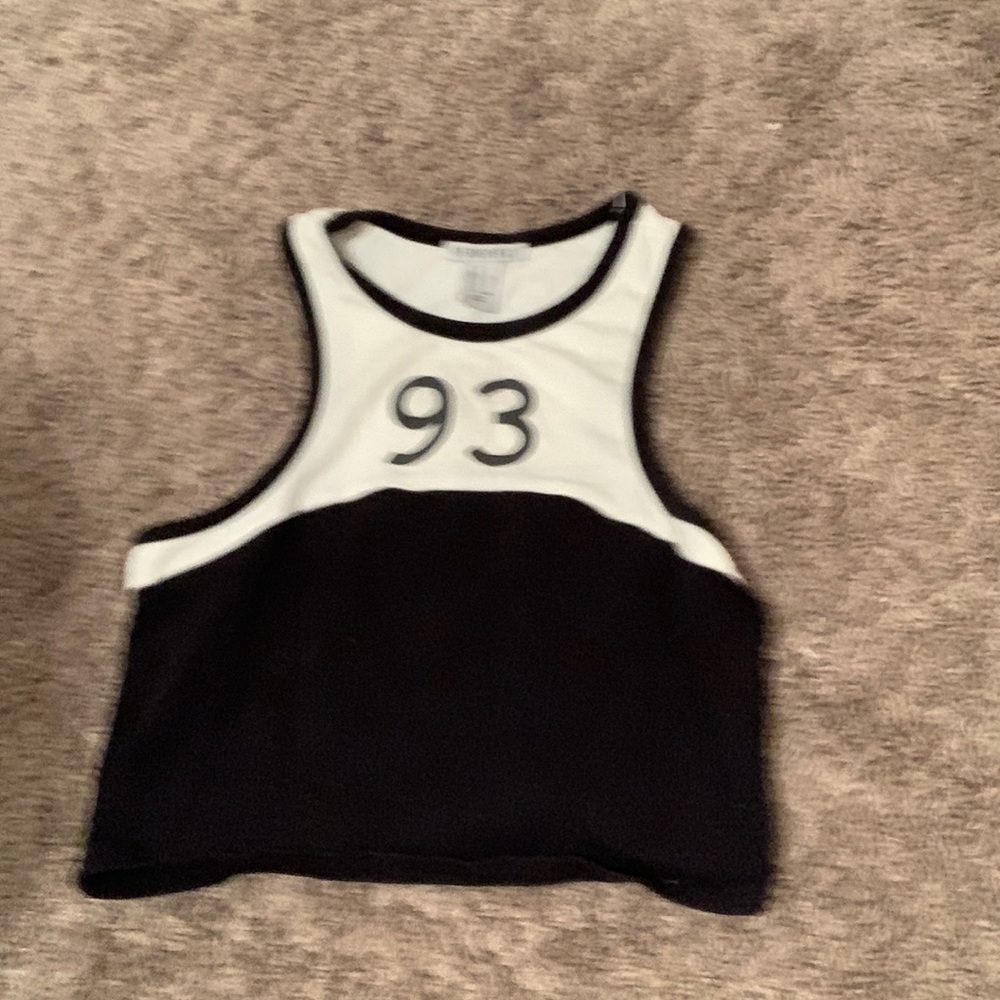 Forever 21 tank top. I’ve worn this like once super good condition